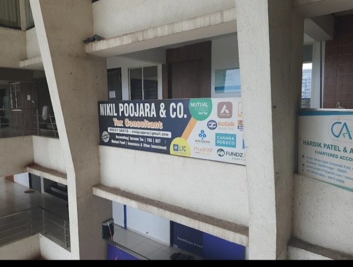 Nikil Poojara & Co. Tax Consultants