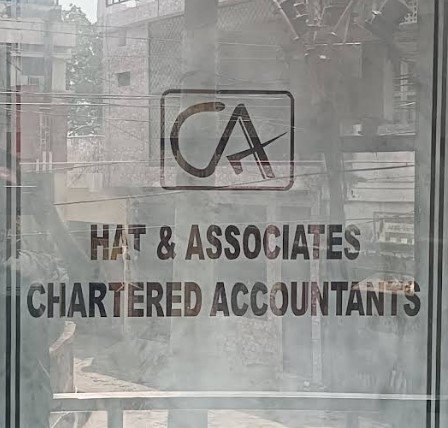 HAT & ASSOCIATES , CHARTERED